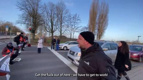 Climate Activist blocking Road gets some much needed Reality Slapped into him!