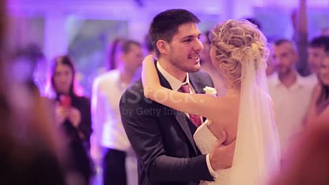 Bride and groom dancing together their first dance