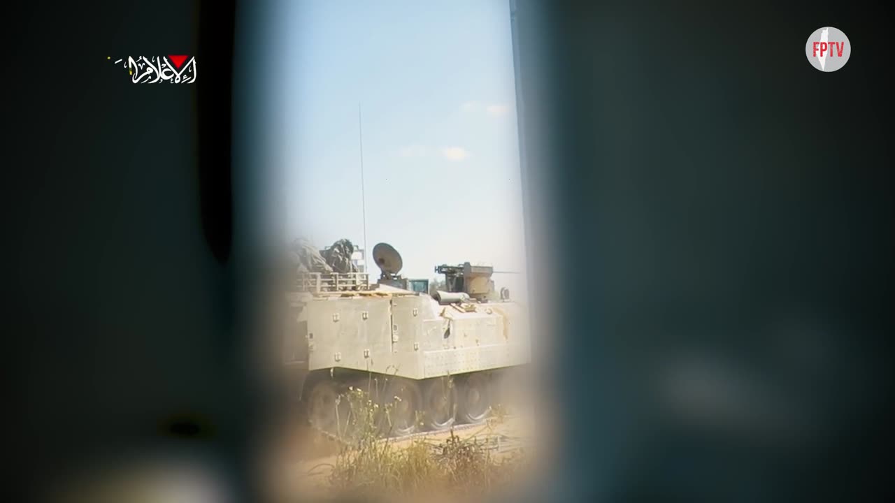 Al-Qassam Brigades striking a Zionist APC north of Beit Lahia, Gaza, Palestine, 13 Oct 2024