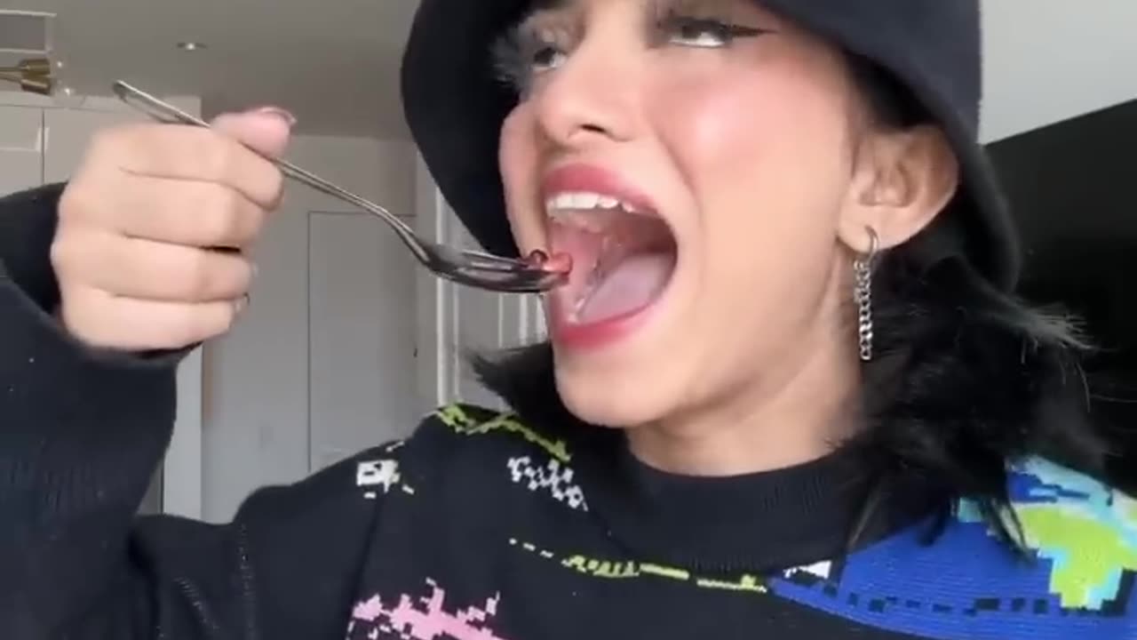 People with siblings trying to eat snacks