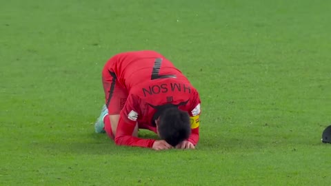 HEUNG-MIN SON CRYING AFTER SOUTH KOREA ADVANCE TO ROUND OF 16