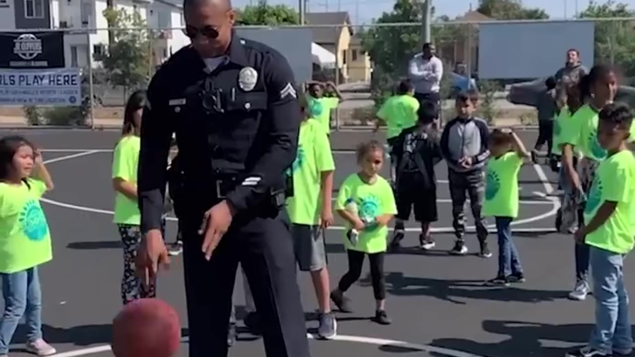 Police Officer Makes Impossible Shot in Front of Kids Camp😱😱😱😱
