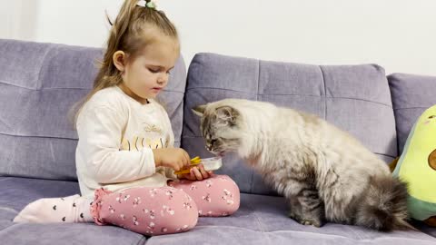 Adorable Baby Girl Funny Feeding a Cat! [TRY NOT TO LAUGH]