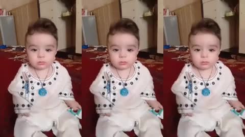 Cute Baby in mood of camera.