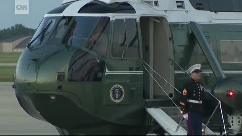 Trump stops to retrieve Marine's hat 2017