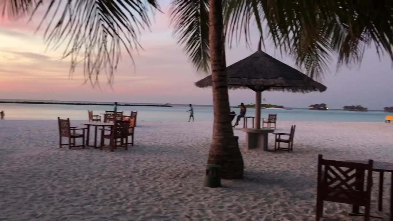 "Sunset Serenity: Unveiling the Tranquil Beauty of Maldives' Beach scape":