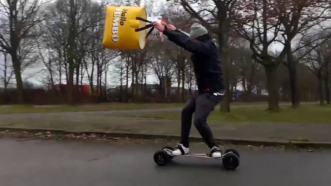 Guy Kiteboards with Grocery Bags During Storm.