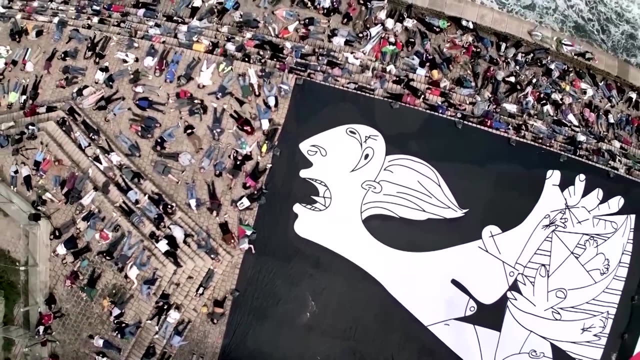 Spanish protesters lie down in tribute to Gaza victims