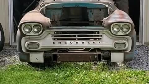 The repairman's process of disassembling the old car frame