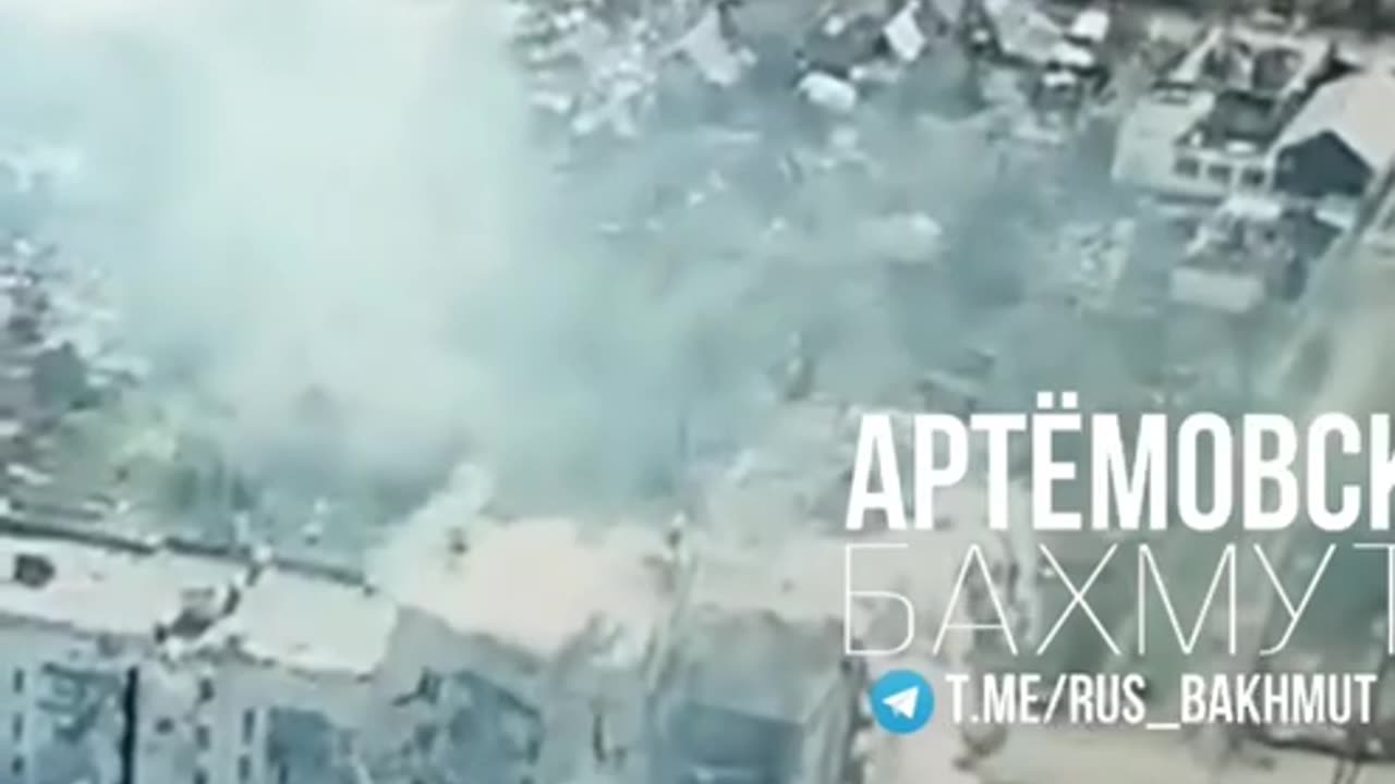 Ukraine blows high building before retreat