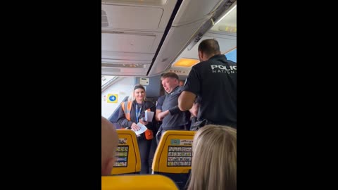 Passengers Cheer as Police Kick Man off the Plane