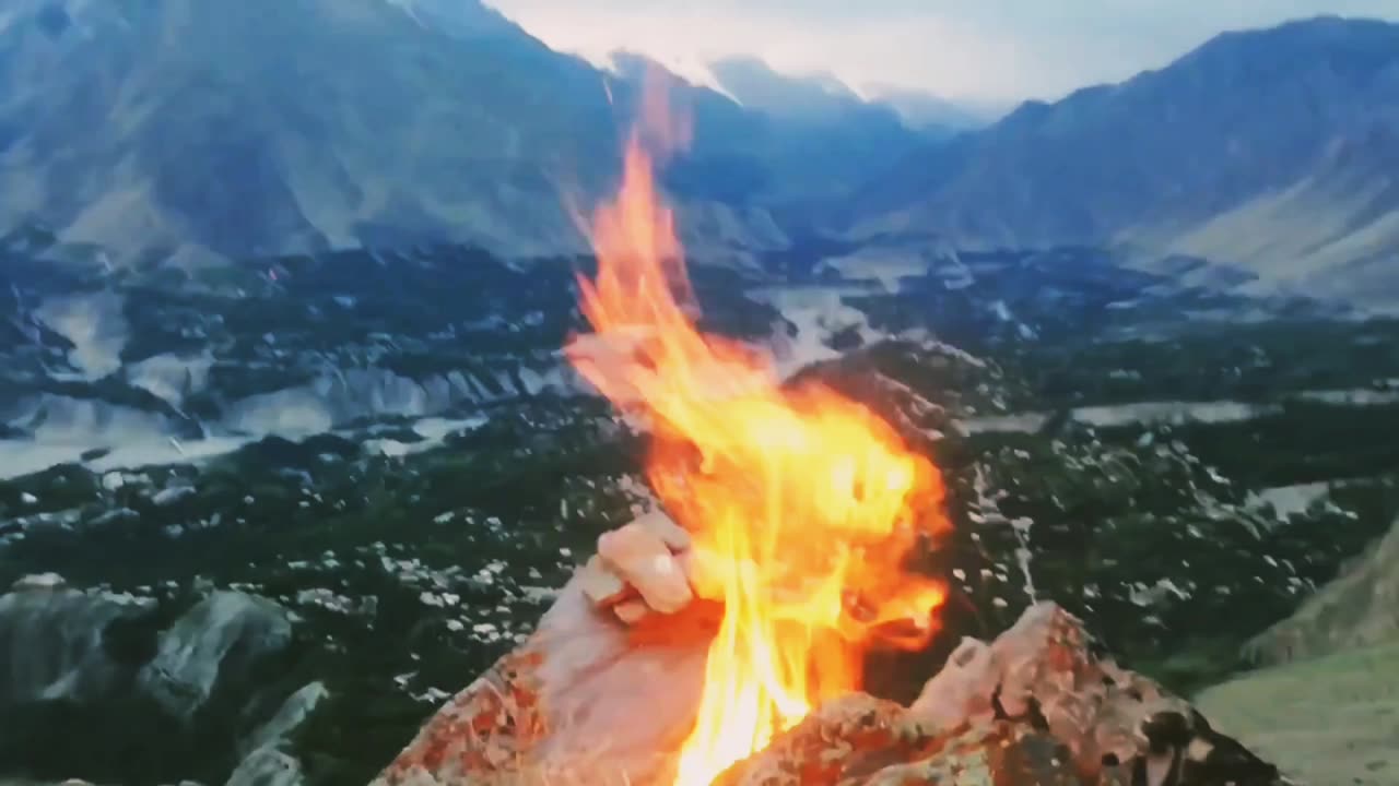 "Blazing Beauty: The Fiery Spectacle of a Mountain Fire"