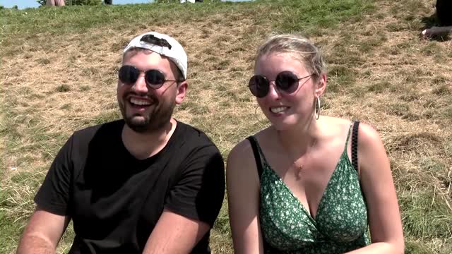 Escaping the Paris heatwave below the Eiffel Tower