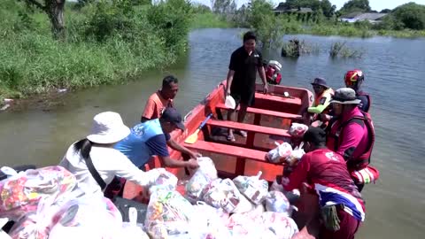 Aid distributed after historic Thai floods