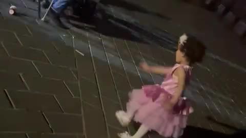 cute girl dancing on Turkish song in Istanbul Asia side with a blind singer and his wife