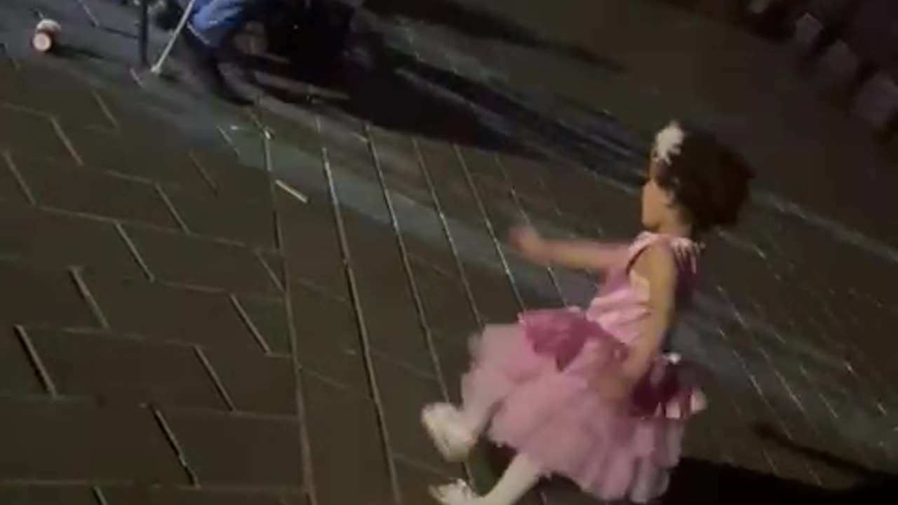 cute girl dancing on Turkish song in Istanbul Asia side with a blind singer and his wife