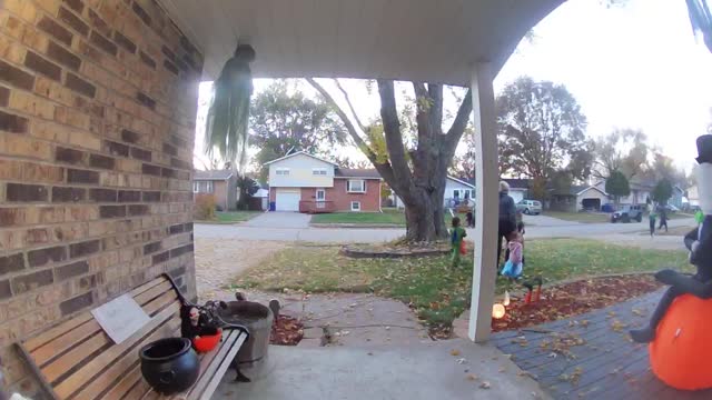 Old Lady and Kids Empty Buckets of Candy for Themselves