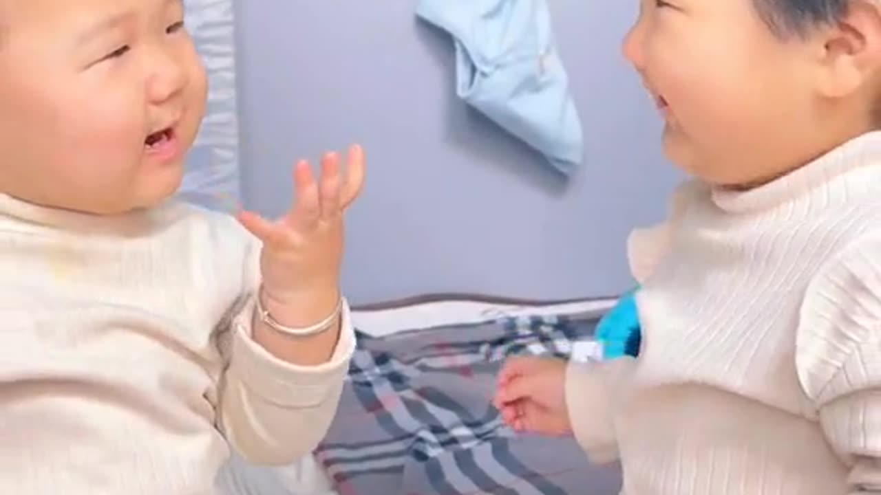 Cute babies fight