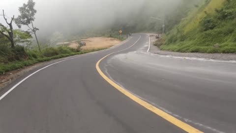 vlog, downhill road in the hills using a motorbike
