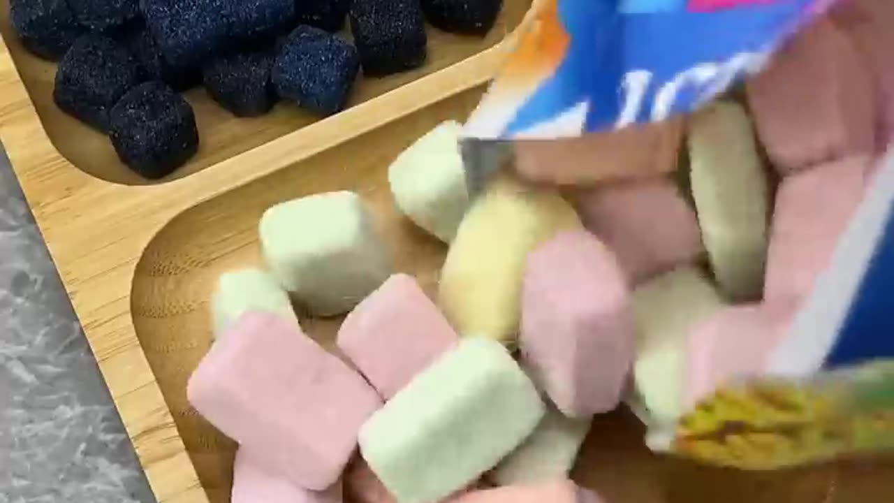 Filling Platter With Sweet And Sour Chewy Gummys