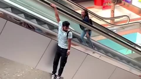 Boy Hanging by stairs | Viral Mall Boy