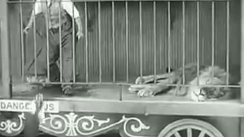 Charlie Chaplin in Lion's Cage