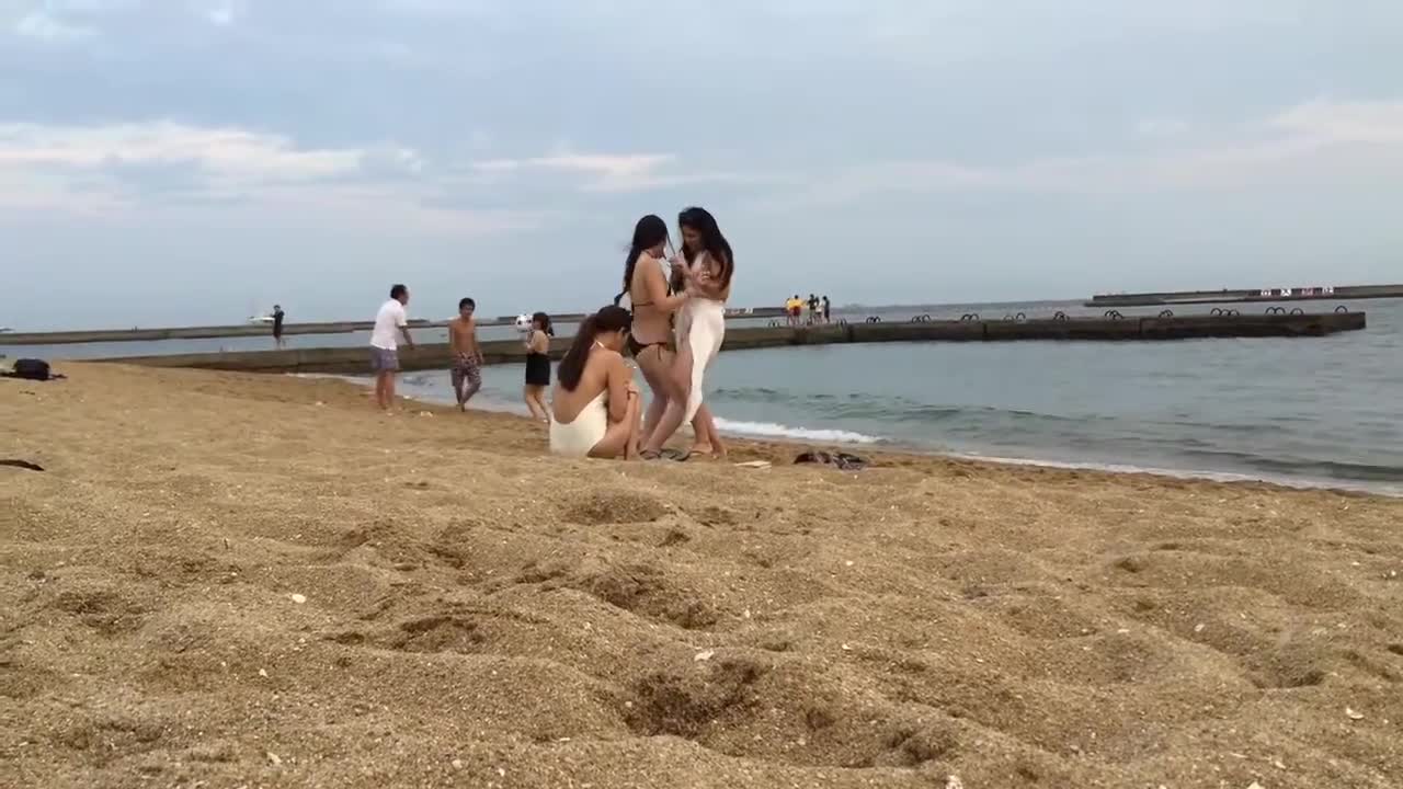 Japanese Girls Dancing on the Beach