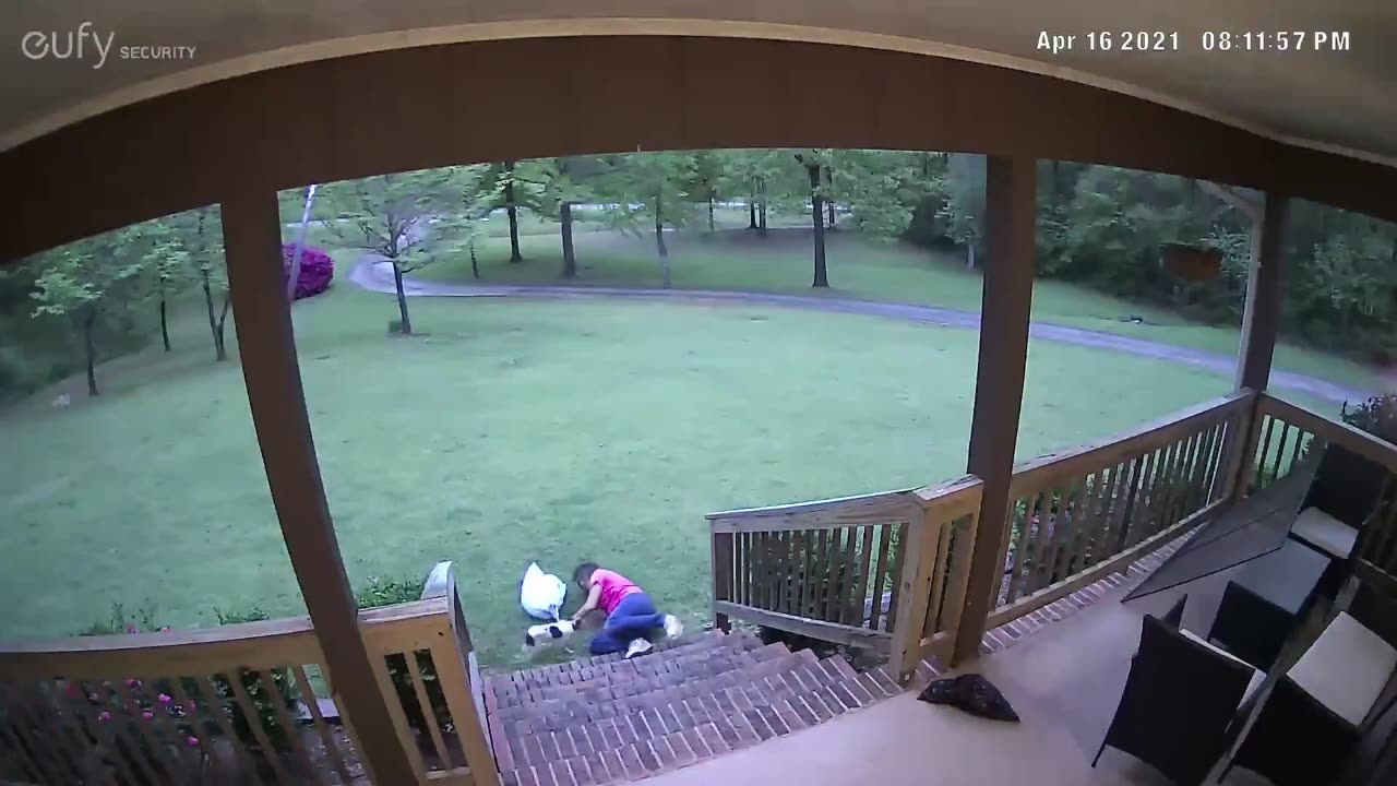 Woman Wipes Out on Steps Taking Out Trash