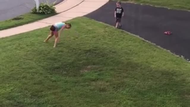 Little boy attempts cartwheels, fails miserably