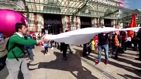 Macron effigy laid on train tracks in protest