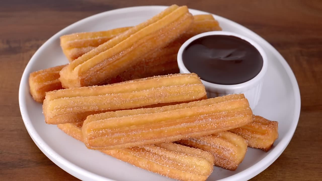 "Perfect Churros Recipe: Crispy and Fluffy Delights with Decadent Hot Chocolate"