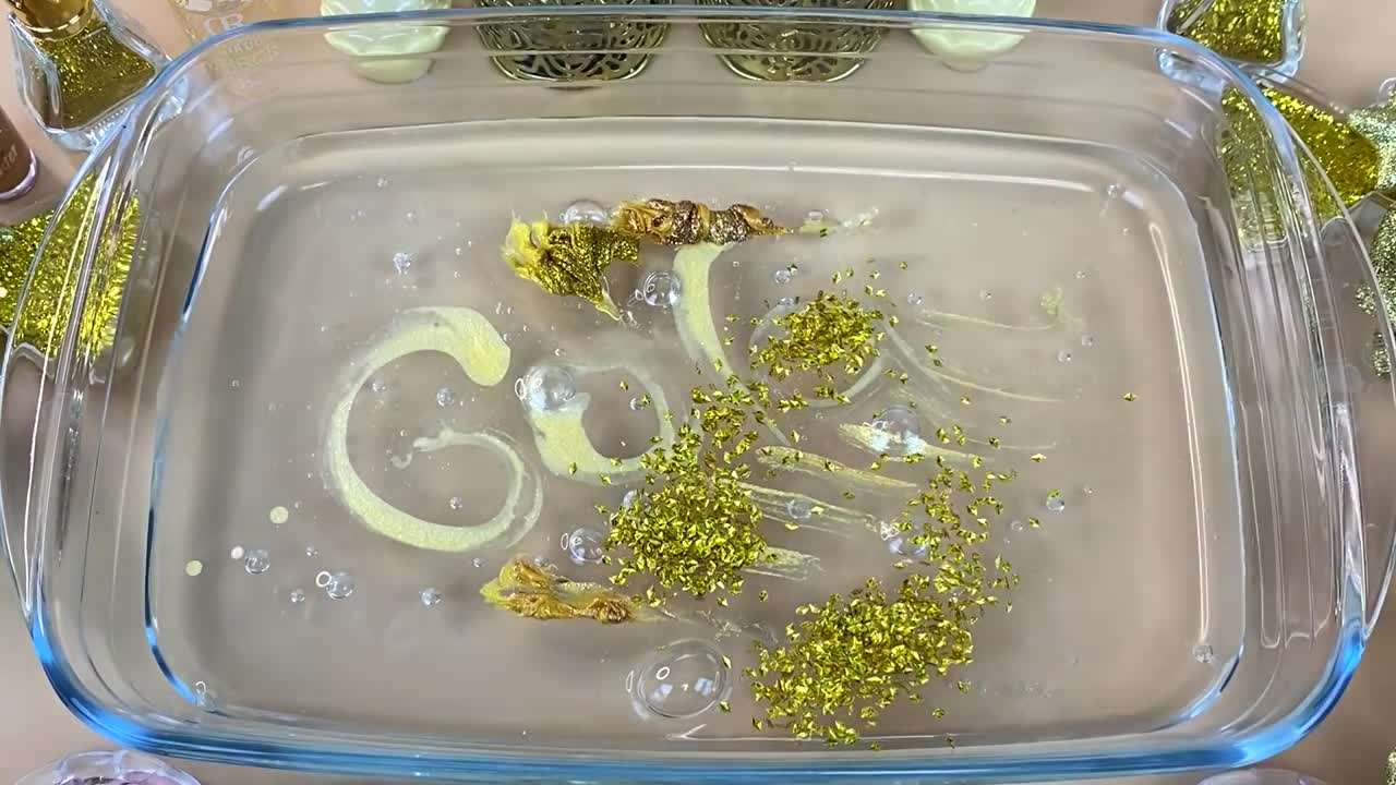 GOLD SLIME | Mixing makeup and glitter into Clear Slime | Satisfying Slime Videos