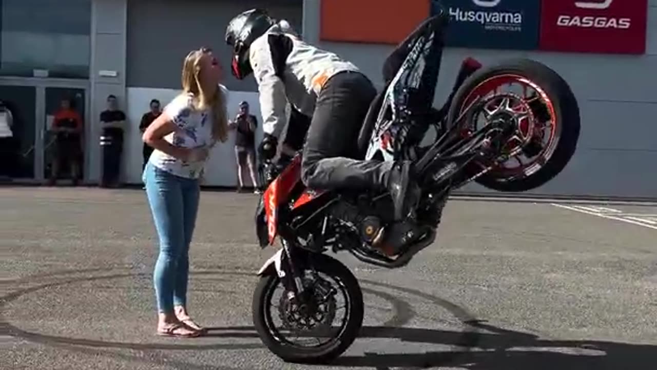 Surprise KTM stunt show with stoppie