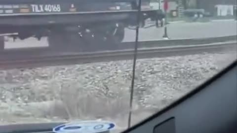 Train derails right in front of cars