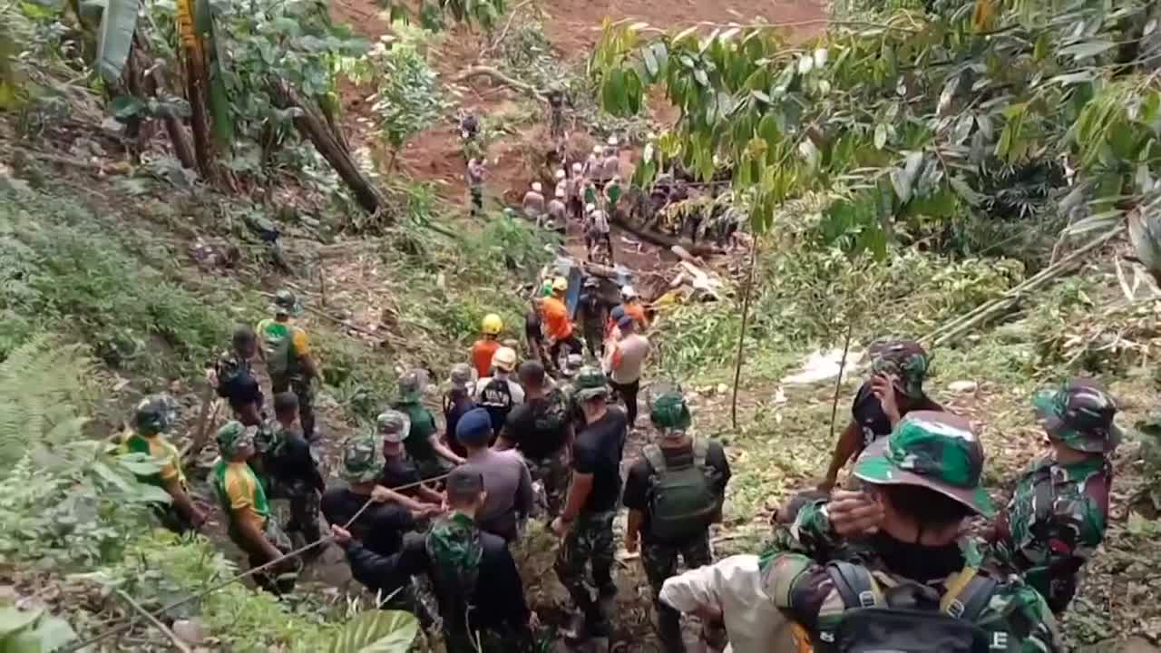 Images of destruction and search for victims after deadly Indonesia earthquake