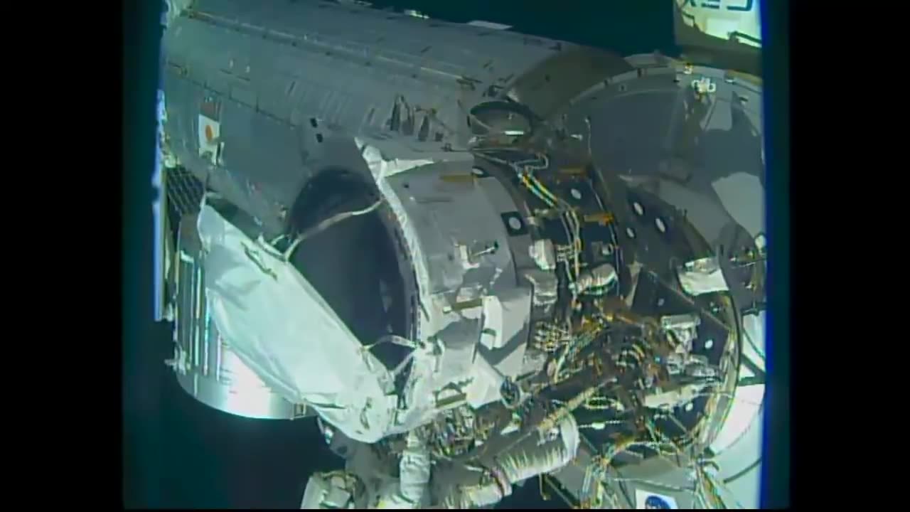 American Astronauts Install New Docking Port for U S Commercial Crew Vehicles
