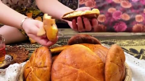 Cooking Delicious Stuffed Bread & local dish in a Clay Oven