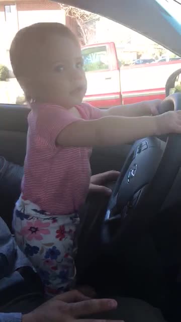 Baby gets excited for her favorite song!