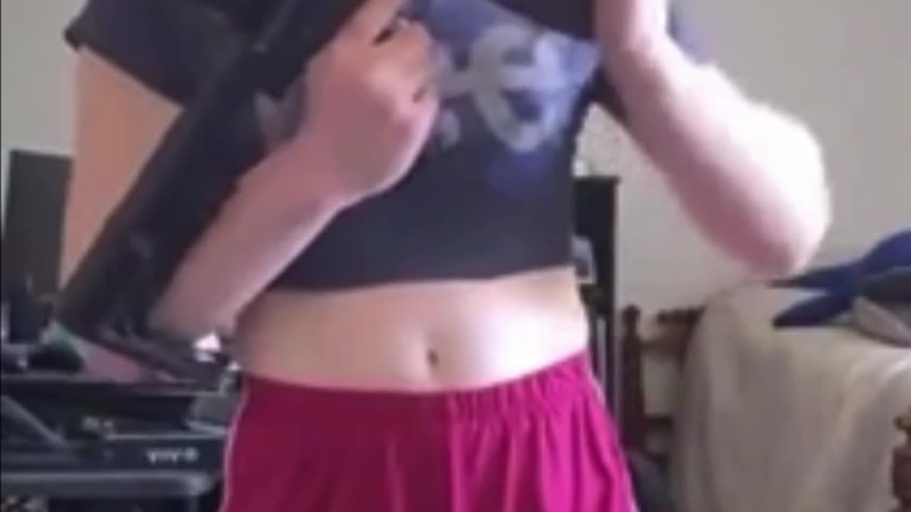 Transgender Shows Off Her Gun As A Warning To Transphobes