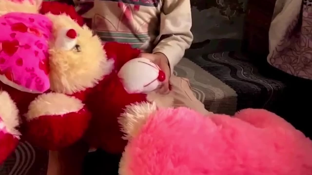 Small baby with teddy