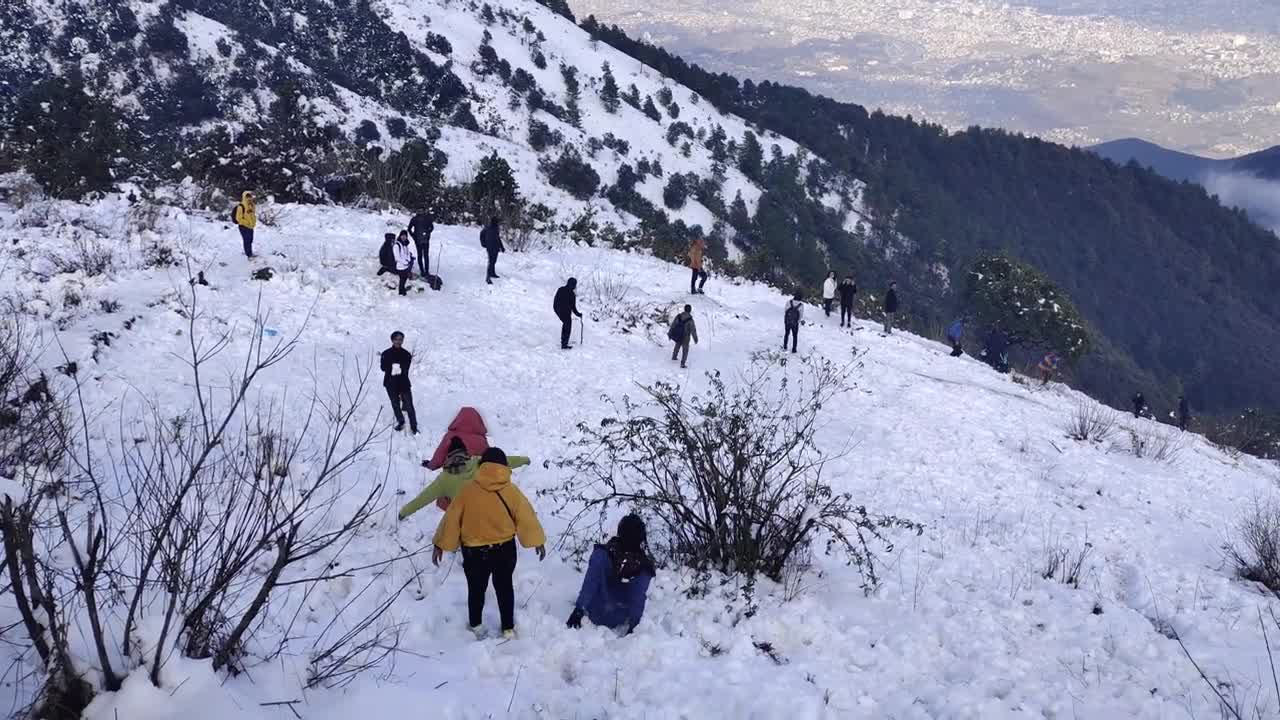 People enjoying snow.