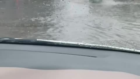 Rainfall has turned street into pond