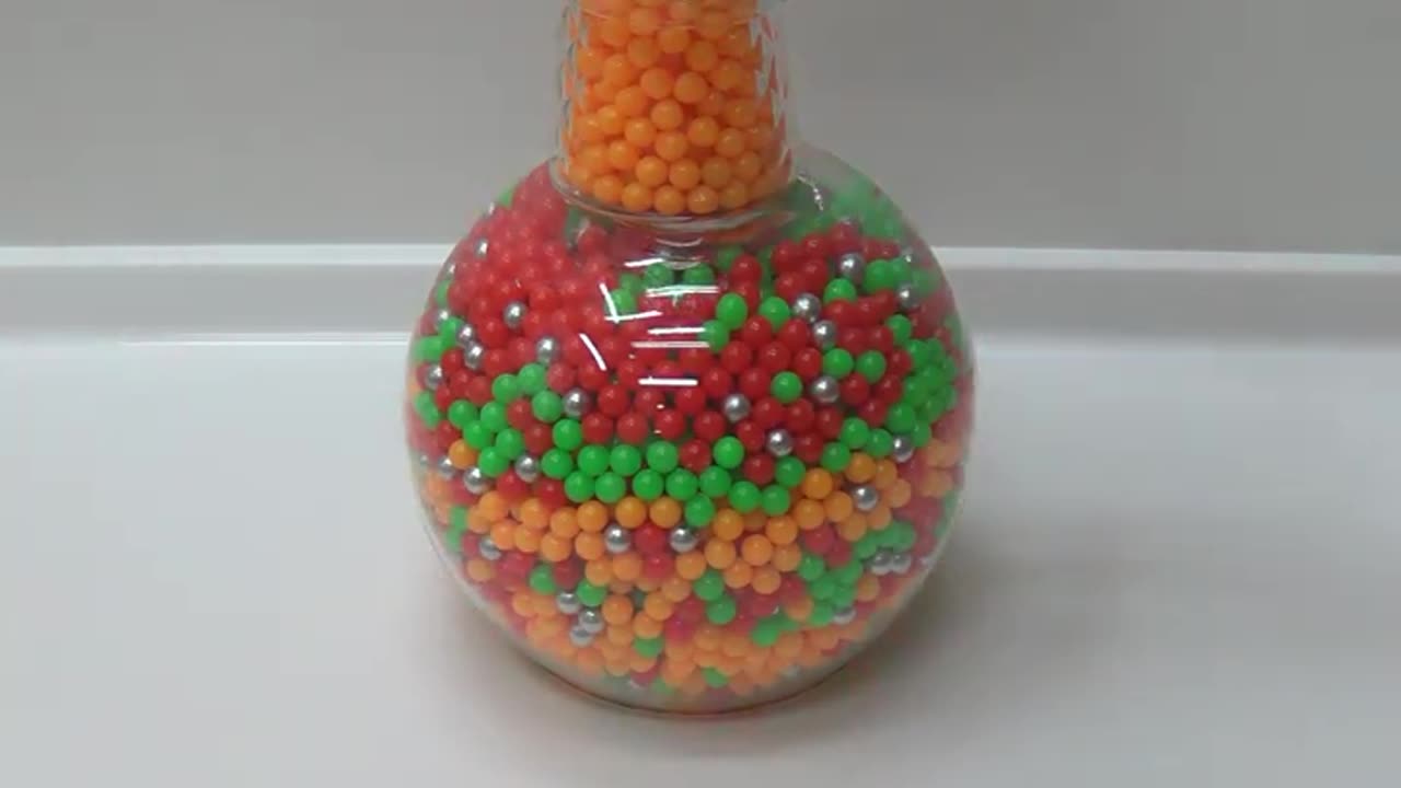 Tower of Plastic Beads Oddly Satisfying