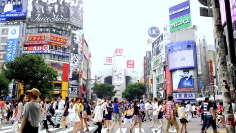 People come and go on the streets of Tokyo, Japan