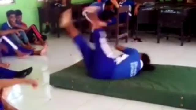 funny school kid try to rolling move