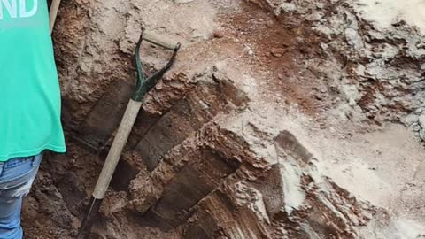 Recessed car lift and clay soil evaluation