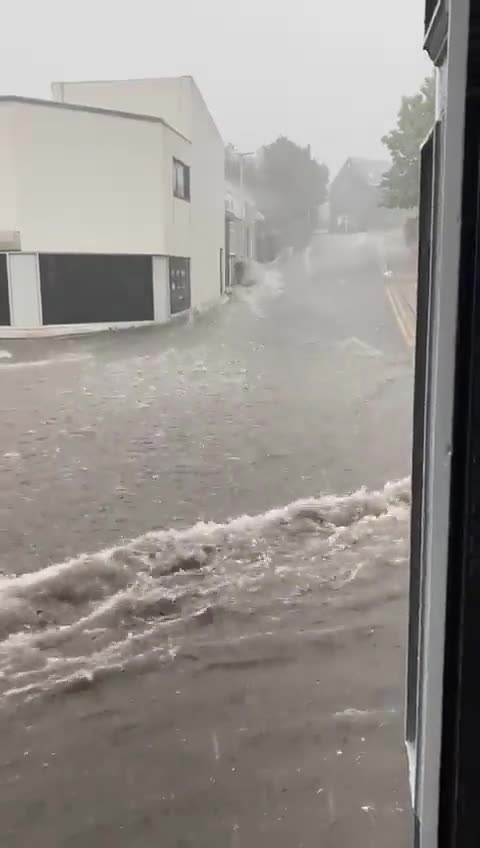 Heavy floods at street due to extreme rain in Gateshead, England