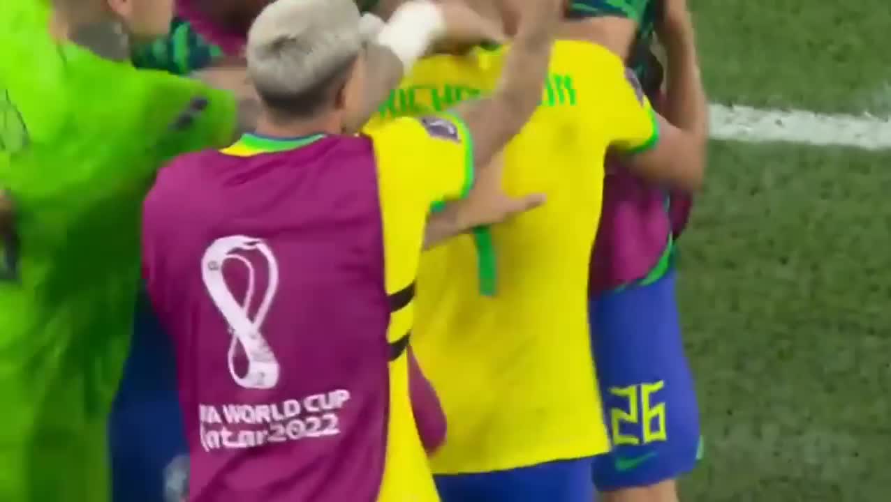 Brazil coach Tite dancing celebration with Richarlison