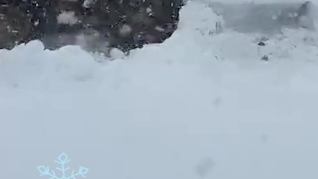 Plow gets stuck in "historic" snowfall in Buffalo, New York