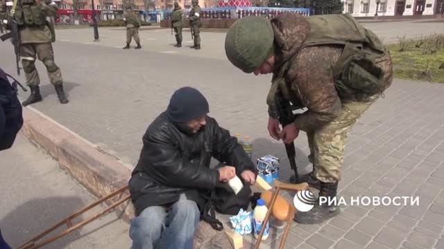 The Russian military hands out essentials in Kherson